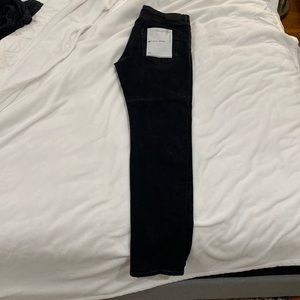 Black faded purple jeans